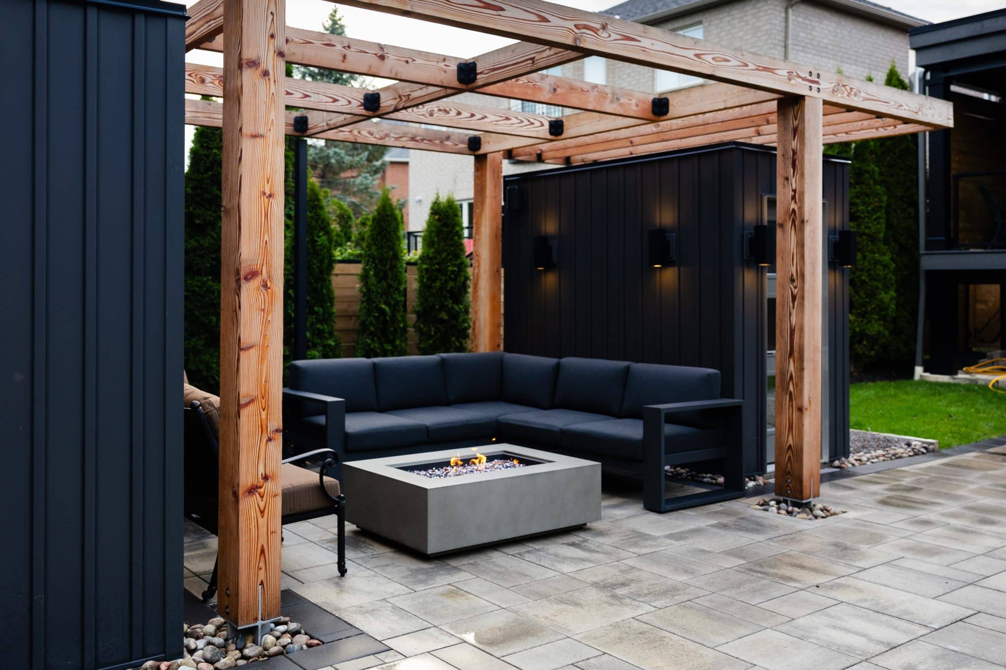 Custom Backyard Cabana with the firepit in Toronto by Avanti Landscaping